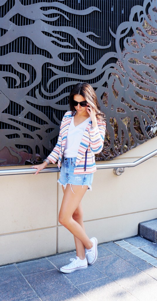 Trina Turk Pattern Blazer with cut off shorts and converse